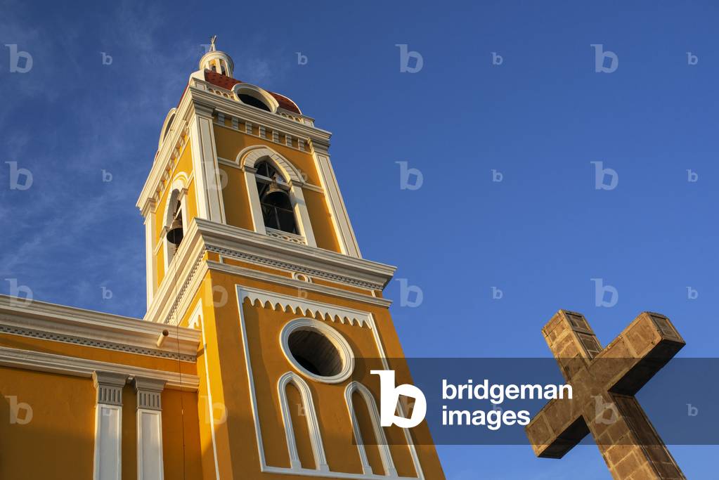A view of the bright yellow and very colorful Cathedral of Granada Nicaragua, Central America, America (photo)
