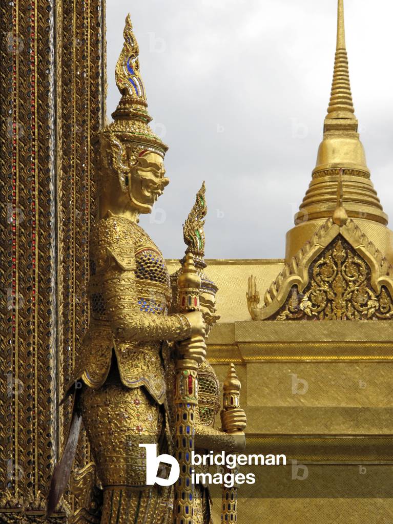 Mythical beast statue guarding the Phra Mondop library building on the grounds of the Grand Palace, Bangkok, Thailand (photo)