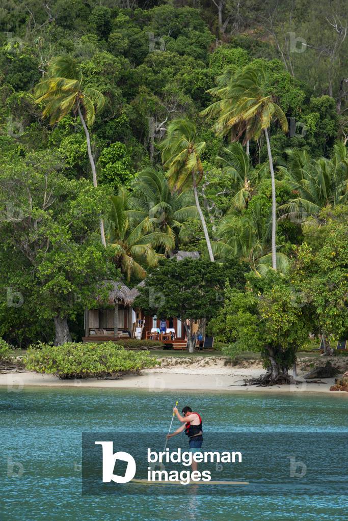 Torust practicing paddel surf in Likuliku Lagoon Resort, Five Star Resort, Malolo Island, Mamanucas, Fiji, 2020 (photo)