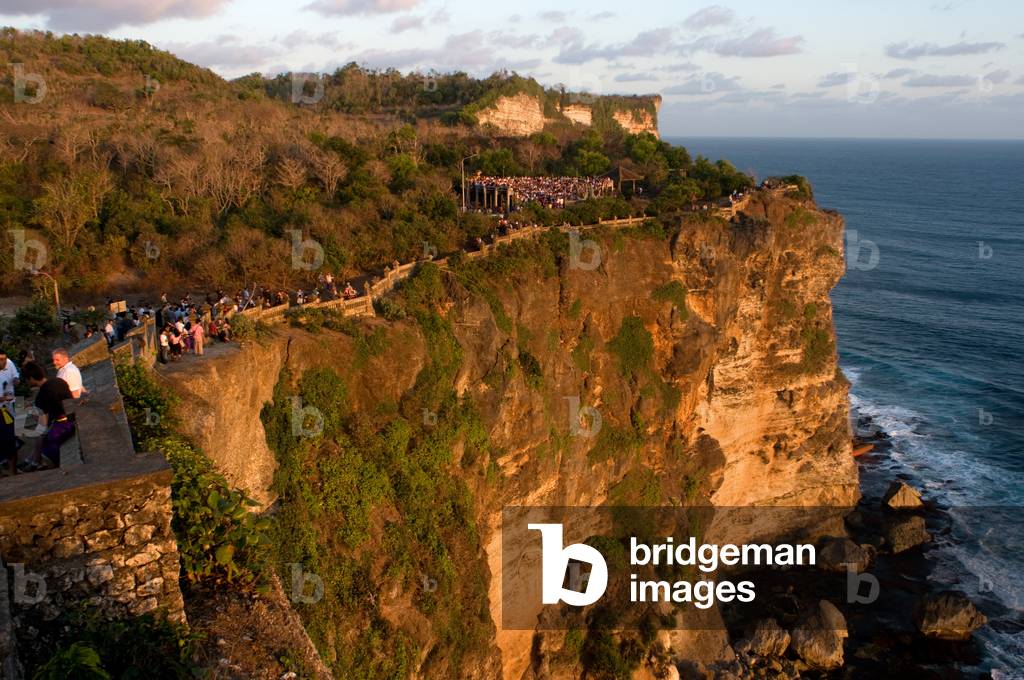 Tourists along the Cliffs Next to the Ulu Watu Temple Pura Luhur, Bali  (photo)