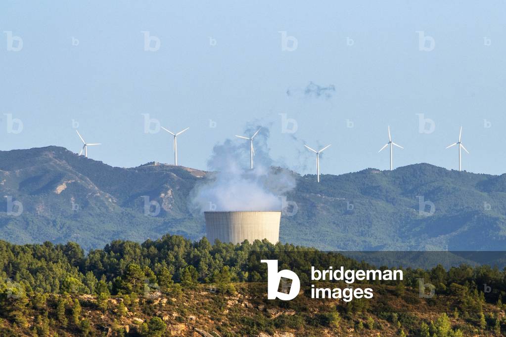 Asco nuclear power plant and windmills in the near mountains, TARRAGONA, 2021 (photo)
