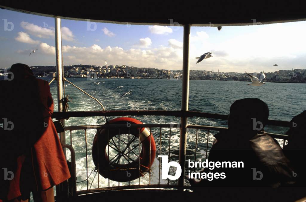 Inside ferry from Uskudar to Eminonu, Turkish flag, Istanbul, Turkey (photo)