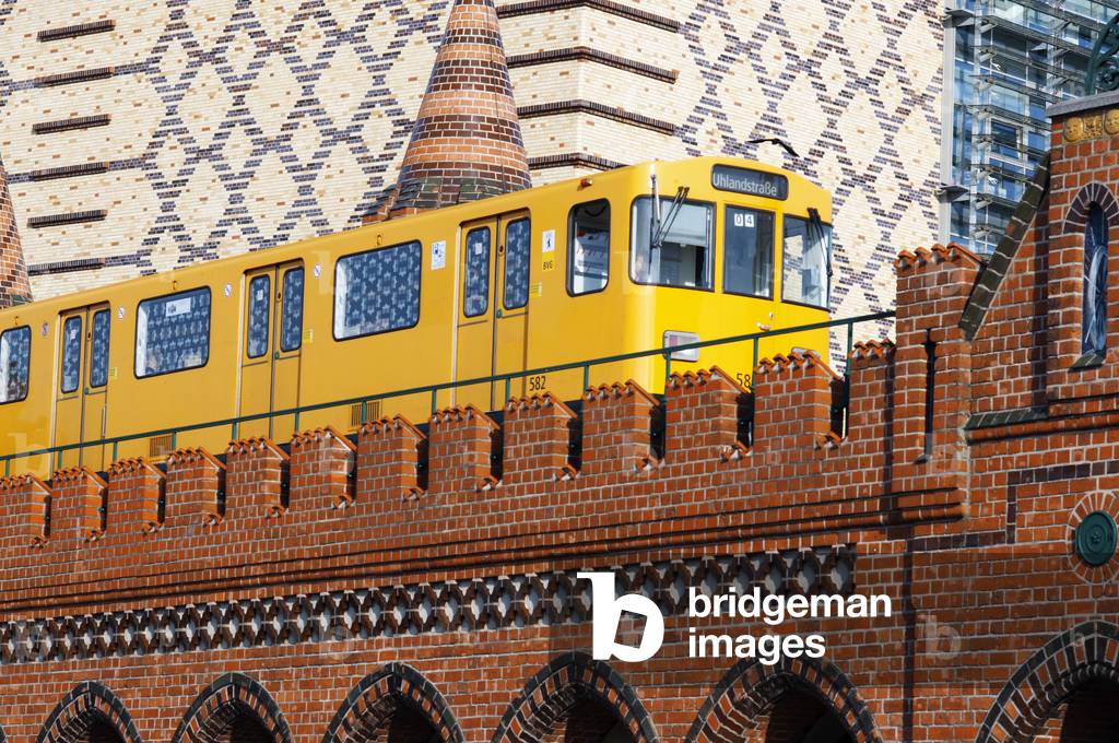 S-bahn train over Oberbaum bridge Oberbaumbrucke in  Friedrichshain Kreuzberg Berlin, Germany, Europe (photo)