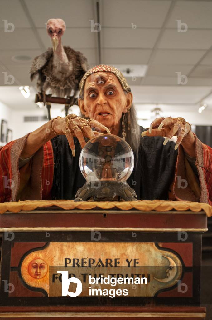 Witch fortune teller with crystal ball portrait  Society of Illustrators building, an art organization on the Upper East Side of Manhattan, New York City, USA (photo)