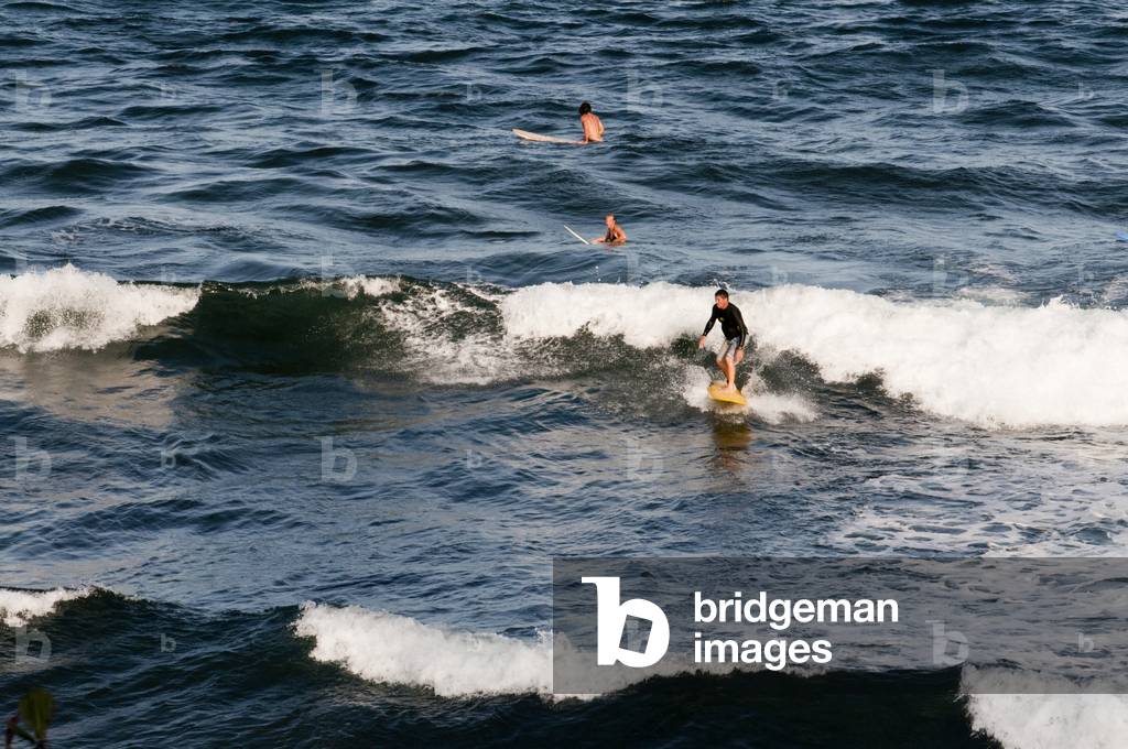 Surfers at Honoli'i Beach, Big Island, Hawaii (photo)