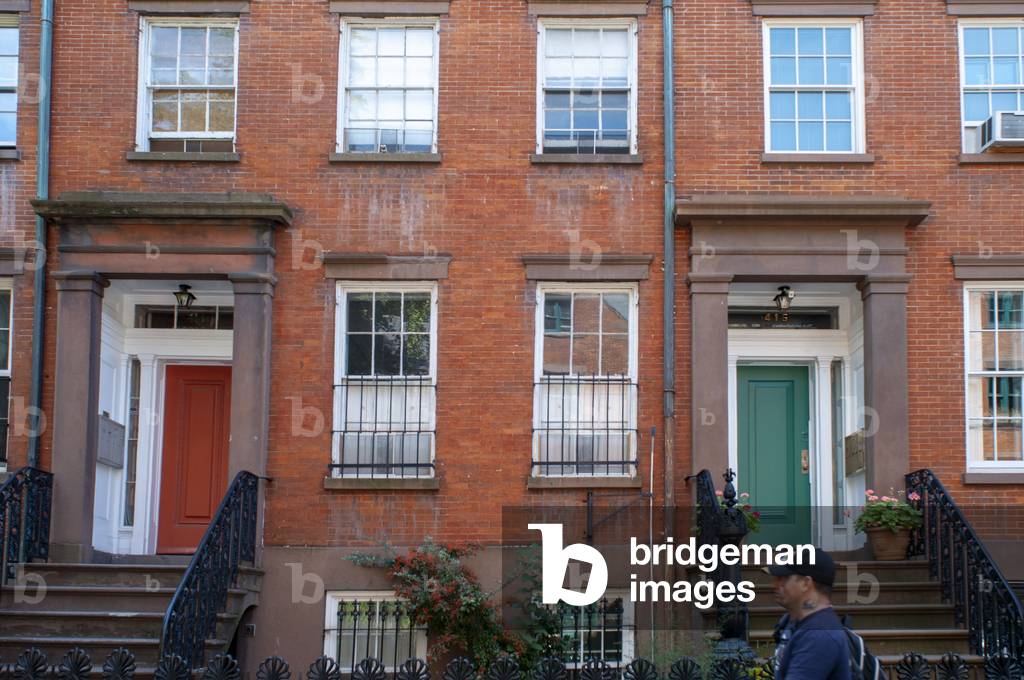 Close up of the exterior of the Chelsea brick house in Chelsea neighborhood Manhattan, USA (photo)