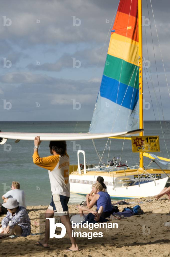 Surfer at Waikiki Beach, O'ahu, Hawaii (photo)