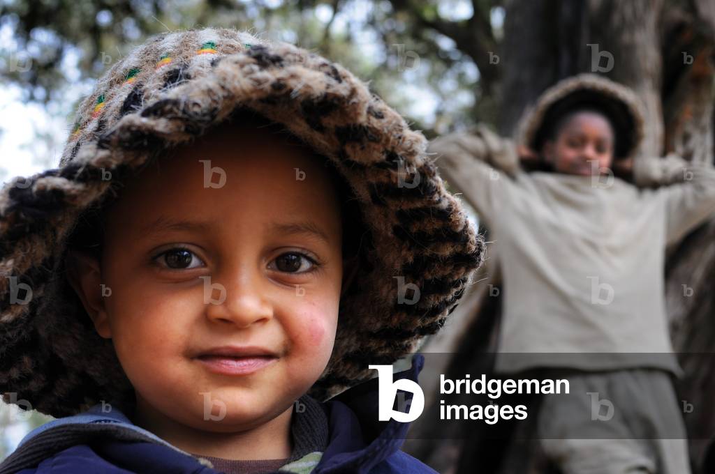 Children in Mount Entoto Eucalyptus Forest above Addis Ababa, Ethiopia. The sacred forests of nothern Ethiopia. (photo)