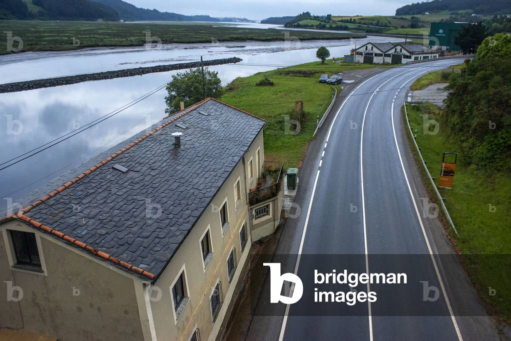 Country road in the mountains and Rio Negro black river above Luarca, NORTH OF SPAIN, 2021 (photo)