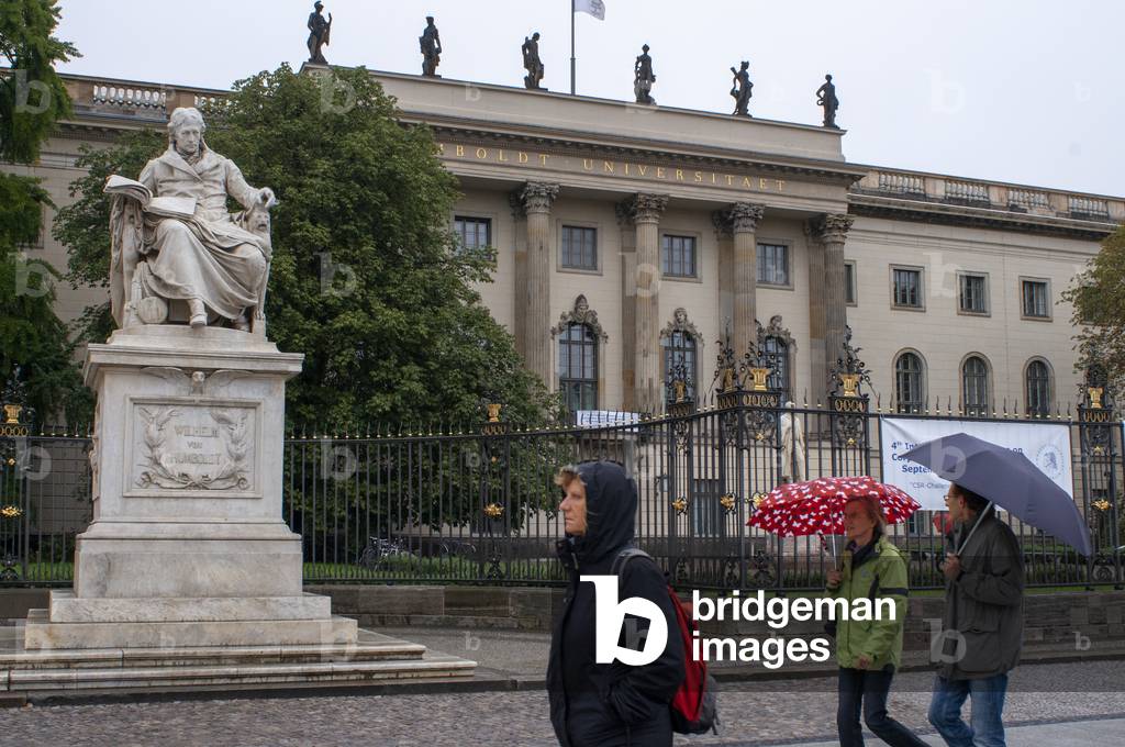Humboldt University. Facade and statue of the German physicist Hermann von Helmholtz (1821-1894). Berlin, Germany (photo)