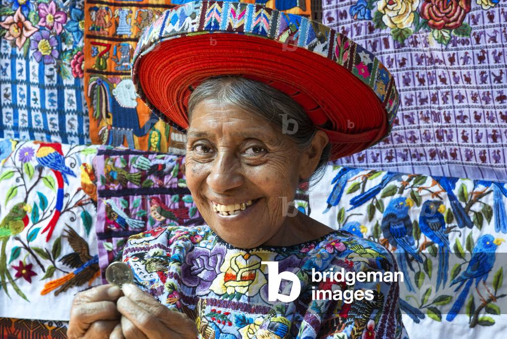 Concepcion Ramirez is the woman Tzutujil appears on coins of 25 cents of Guatemala, Woman in traditional dress as profiled on 25 cent coin Santiago Atitlan Guatemala Central America, 2020 (photo)