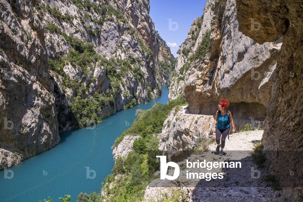 Congost de Mont-Rebei in the Pre-Pyrenees of Lleida, Catalonia, Serra del Montsec, La Noguera, Lleida, Spain

The Montrebei Gorge (in Catalan Congost de Mont-Rebei) is a place that is located between the provinces of Huesca and Lérida (Spain), between the regions of Ribagorza and Pallars Jussà, It is constituted in the narrowest part by which the Noguera Ribagorzana river, which constitutes the natural border between Aragon and Catalonia, crosses the Montsec mountain range, walls in vertical fall of more than 500 meters and a width at its minimum point of 20 meters , The Catalan part is part of the Noguera Nature Reserve, It is within the Sierra del Montsec Natural Interest Area, 2020 (photo)