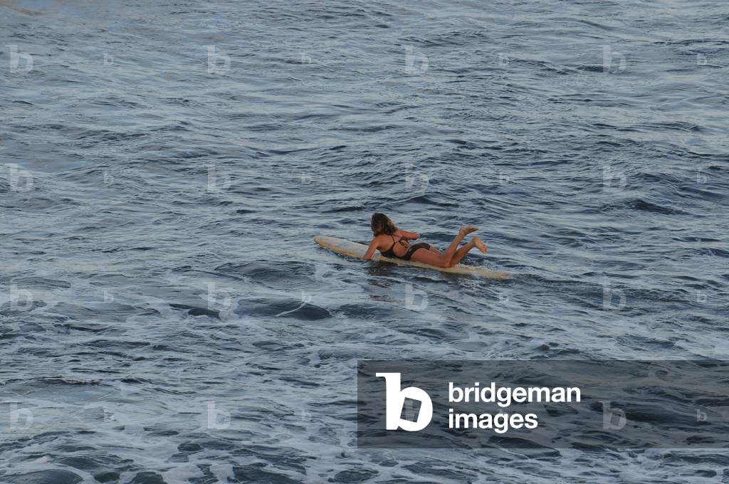Surfer at Honoli'i Beach, Big Island, Hawaii (photo)