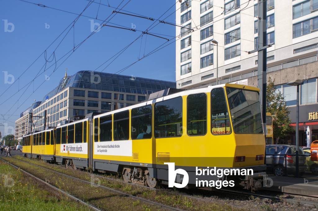 Berlin street scene and tram passing in the streets of Mitte Berlin, Germany (photo)