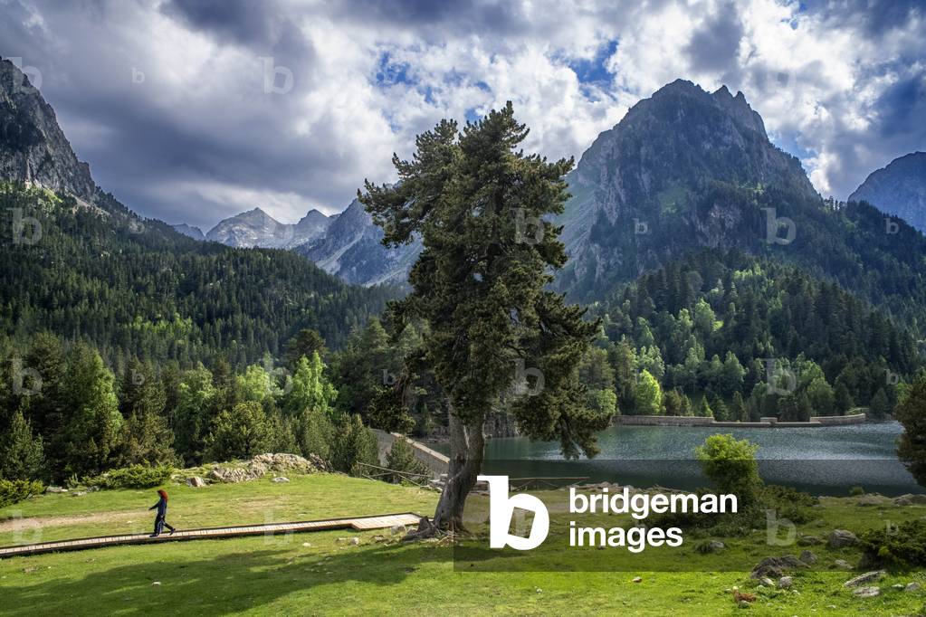 Encantats peaks seen from Sant Maurici lake, Lleida, 2021 (photo)