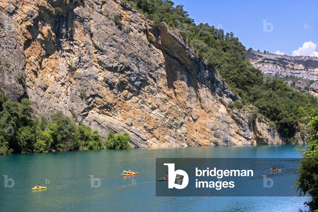 Congost de Mont-Rebei in the Pre-Pyrenees of Lleida, Catalonia, Serra del Montsec, La Noguera, Lleida, Spain

The Montrebei Gorge (in Catalan Congost de Mont-Rebei) is a place that is located between the provinces of Huesca and Lérida (Spain), between the regions of Ribagorza and Pallars Jussà, It is constituted in the narrowest part by which the Noguera Ribagorzana river, which constitutes the natural border between Aragon and Catalonia, crosses the Montsec mountain range, walls in vertical fall of more than 500 meters and a width at its minimum point of 20 meters , The Catalan part is part of the Noguera Nature Reserve, It is within the Sierra del Montsec Natural Interest Area, 2020 (photo)