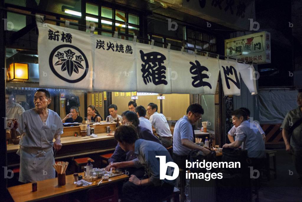 Dining under the train tracks: the Yakitori alley, Tokyo, Japan, March 2020 (photo)