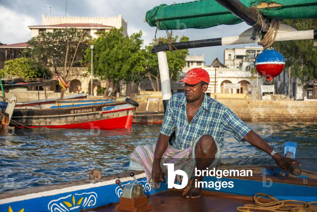 Fisher Boat in the Lamu waterfront, Kenya, Lamu island UNESCO World Heritage site, 2020 (photo)