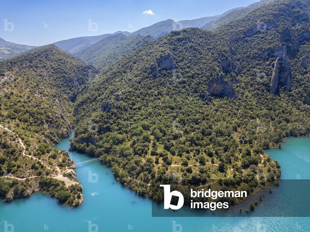 Congost de Mont-Rebei in the Pre-Pyrenees of Lleida, Catalonia, Serra del Montsec, La Noguera, Lleida, Spain

The Montrebei Gorge (in Catalan Congost de Mont-Rebei) is a place that is located between the provinces of Huesca and Lérida (Spain), between the regions of Ribagorza and Pallars Jussà, It is constituted in the narrowest part by which the Noguera Ribagorzana river, which constitutes the natural border between Aragon and Catalonia, crosses the Montsec mountain range, walls in vertical fall of more than 500 meters and a width at its minimum point of 20 meters , The Catalan part is part of the Noguera Nature Reserve, It is within the Sierra del Montsec Natural Interest Area, 2020 (photo)