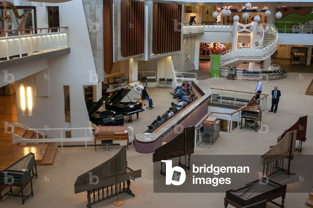 Cembalos on display at Musikinstrumenten Museum or Museum of Musical Instruments in Mitte Berlin, Germanydly, the already crowded city became even more congested (photo)