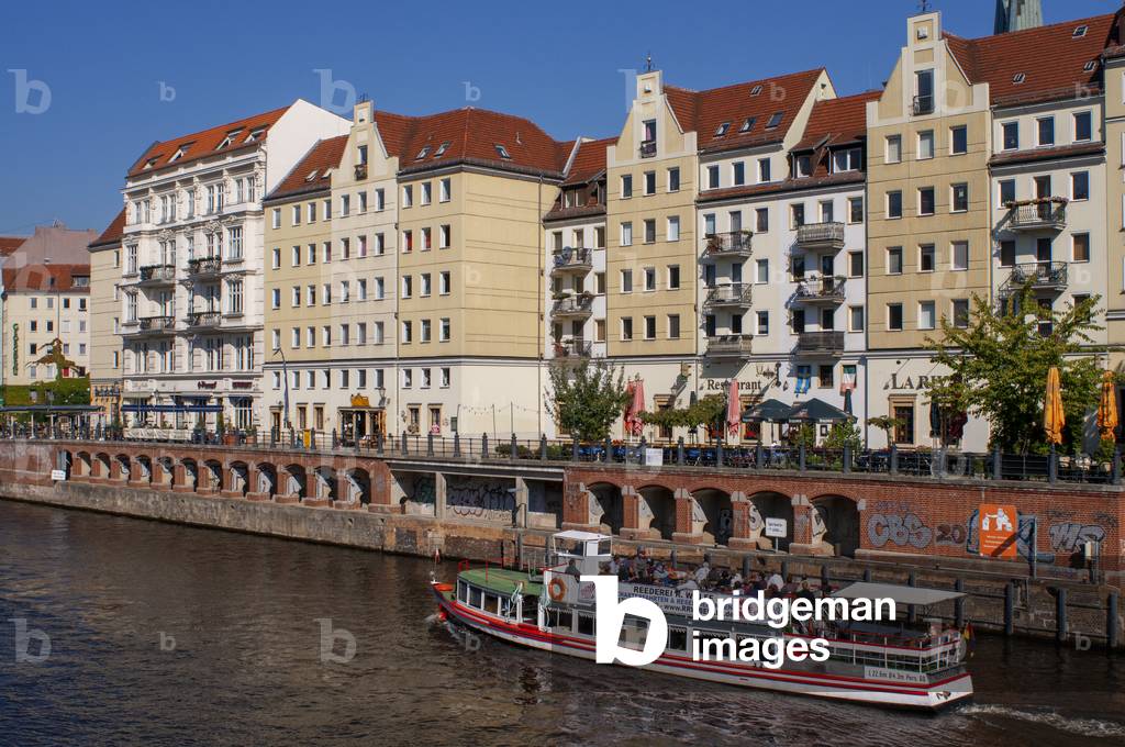 The River Spree, running alongside the Nikolaiviertel, leads towards the historical landmark of Berlin Cathedral, Germany (photo)