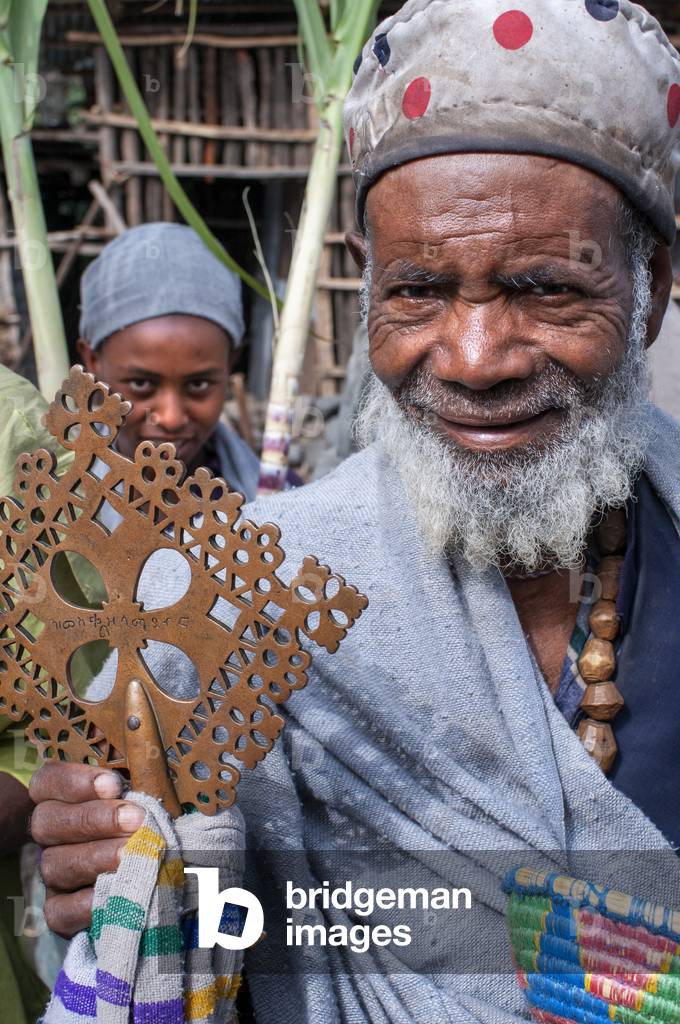 Road between from Wukro to Mekele, Ethiopia, A cleric approaches our vehicle on the road leading from Wukro to Mekele (photo)