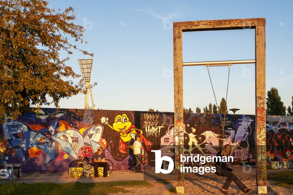 A former part of the Berlin Wall death strip, Graffiti on Mauerpark wall in Berlin, Germany.  (photo)