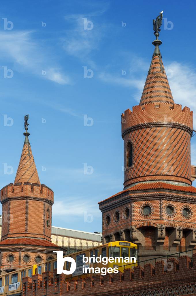 S-bahn train over Oberbaum bridge Oberbaumbrucke in  Friedrichshain Kreuzberg Berlin, Germany, Europe (photo)