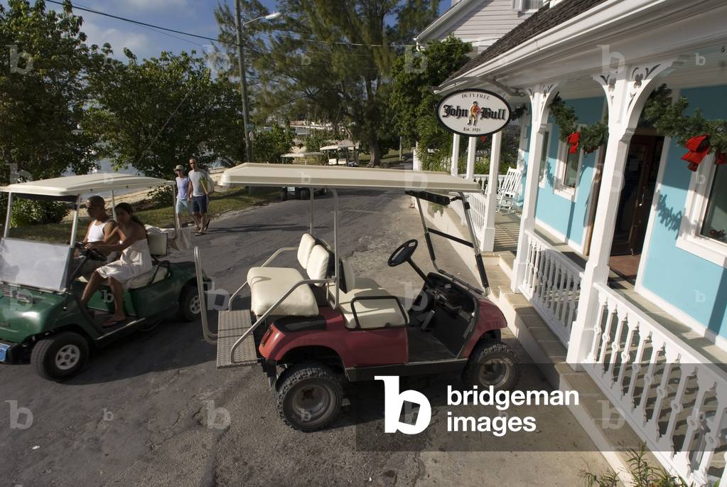 Golf car and loyalist home, Bahamas (photo)
