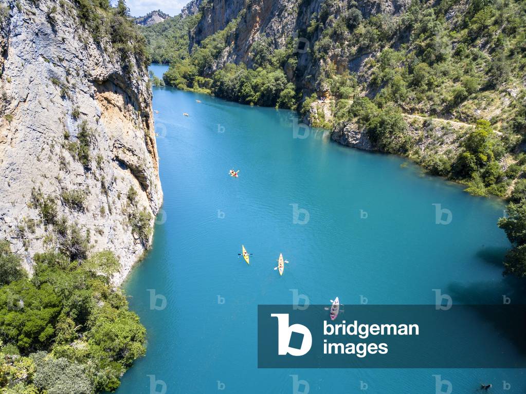 Congost de Mont-Rebei in the Pre-Pyrenees of Lleida, Catalonia, Serra del Montsec, La Noguera, Lleida, Spain

The Montrebei Gorge (in Catalan Congost de Mont-Rebei) is a place that is located between the provinces of Huesca and Lérida (Spain), between the regions of Ribagorza and Pallars Jussà, It is constituted in the narrowest part by which the Noguera Ribagorzana river, which constitutes the natural border between Aragon and Catalonia, crosses the Montsec mountain range, walls in vertical fall of more than 500 meters and a width at its minimum point of 20 meters , The Catalan part is part of the Noguera Nature Reserve, It is within the Sierra del Montsec Natural Interest Area, 2020 (photo)