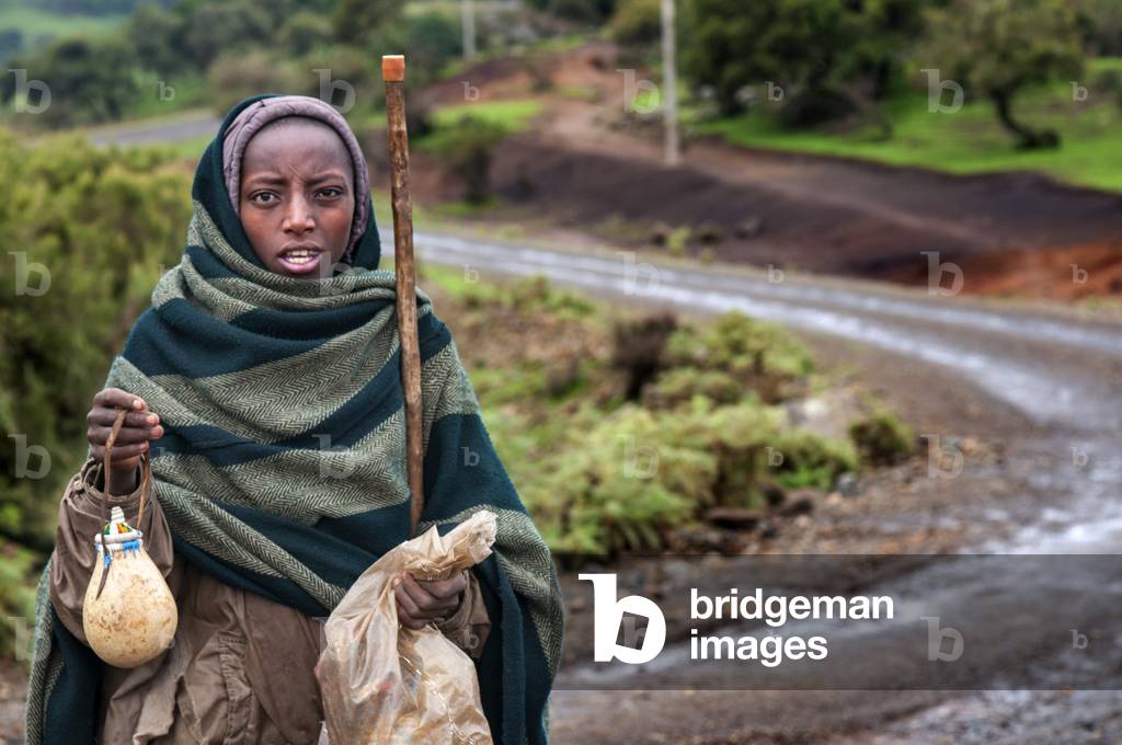 Local villagers selling hats and pots souvenir in the Simien Mountains National Park, Amhara Region, Ethiopia  (photo)