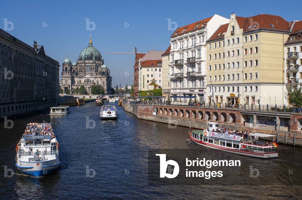 Berlin Cathedral or Berliner Dom and The River Spree, running alongside the Nikolaiviertel, leads towards the historical landmark of Berlin Cathedral, Germany (photo)