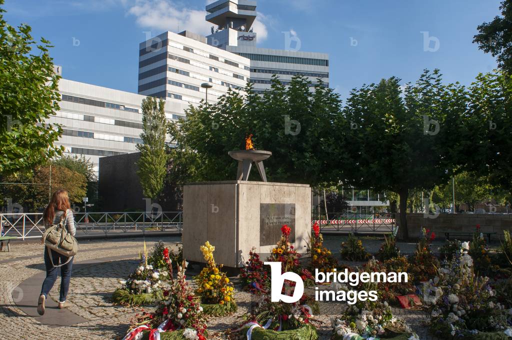 Eternal flame, memorial for the victims of forced displacement, Theodor-Heuss-Platz, Charlottenburg, Berlin, Germany (photo)