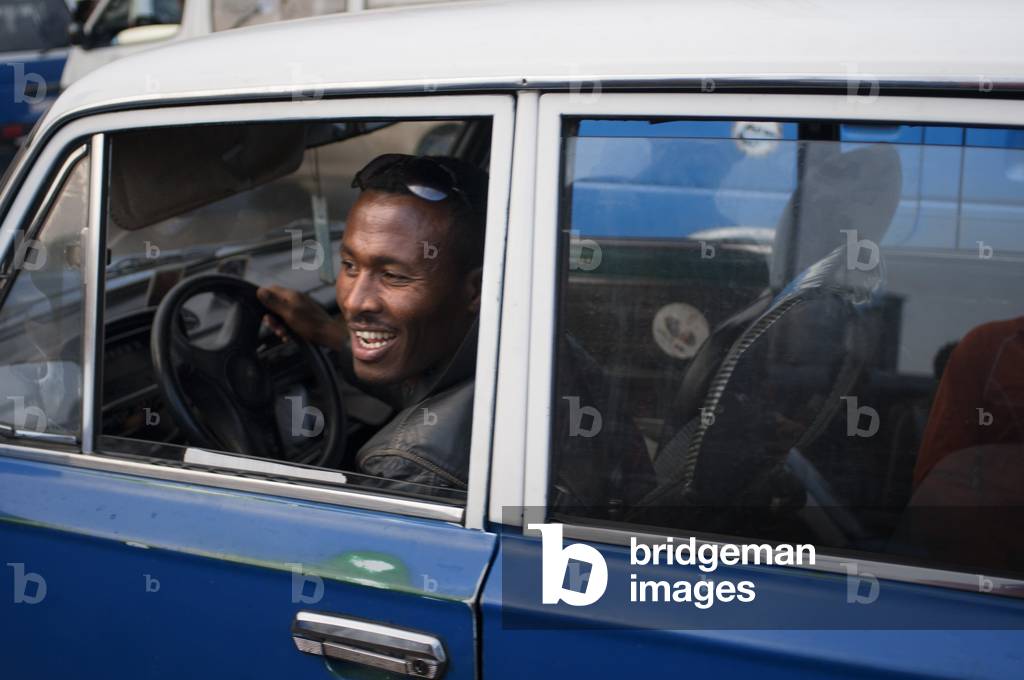 An old Fiat cruising the streets of downtown Addis Ababa (photo)