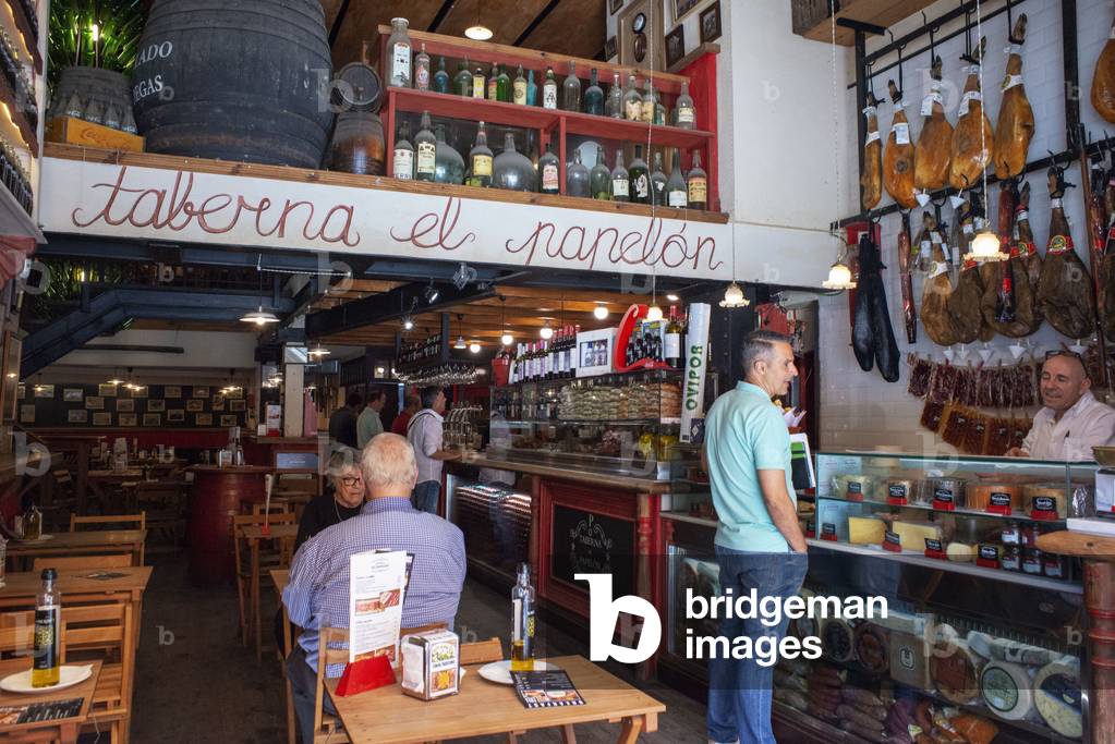 Typical tapas bar food Taverna Papelon. Santa Cruz district, Sevilla, Andalucia, Spain (photo)