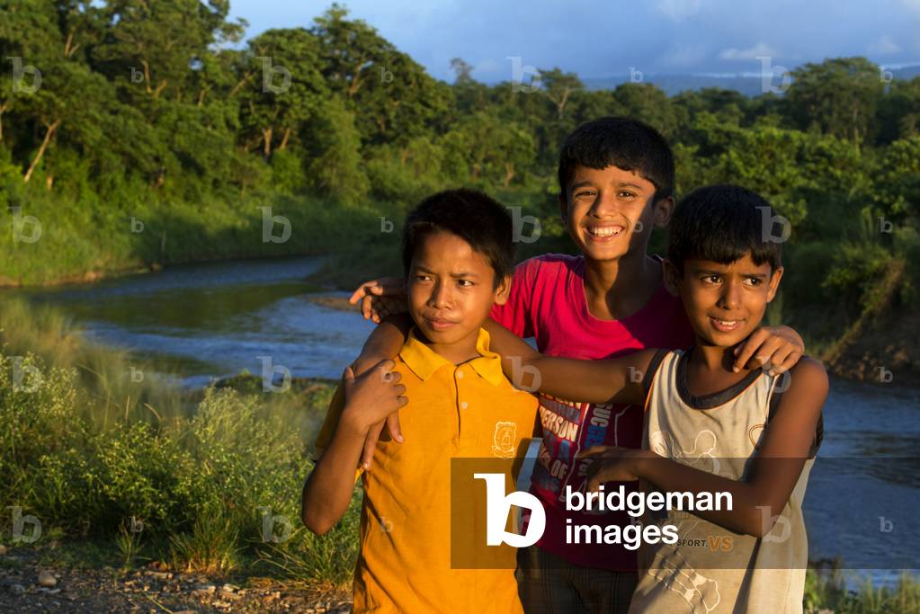 Friend boys in Rapti River, Chitwan National Park, Nepal, Asia (photo)