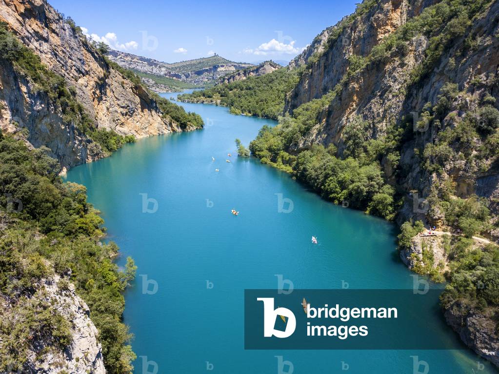 Congost de Mont-Rebei in the Pre-Pyrenees of Lleida, Catalonia, Serra del Montsec, La Noguera, Lleida, Spain

The Montrebei Gorge (in Catalan Congost de Mont-Rebei) is a place that is located between the provinces of Huesca and Lérida (Spain), between the regions of Ribagorza and Pallars Jussà, It is constituted in the narrowest part by which the Noguera Ribagorzana river, which constitutes the natural border between Aragon and Catalonia, crosses the Montsec mountain range, walls in vertical fall of more than 500 meters and a width at its minimum point of 20 meters , The Catalan part is part of the Noguera Nature Reserve, It is within the Sierra del Montsec Natural Interest Area, 2020 (photo)