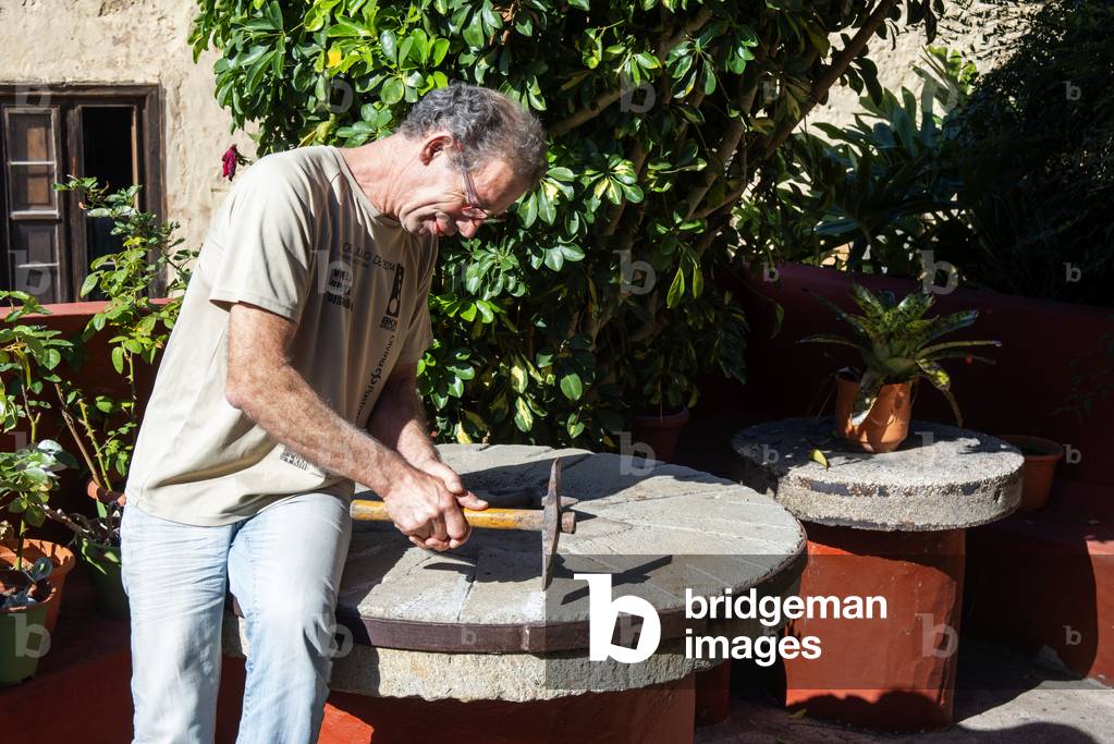 Shop and old water driven mill where toasted corn is ground to make a flour called gofio in a traditional manner in La Orotava, Tenerife Island, Canary Islands, Spain (photo)