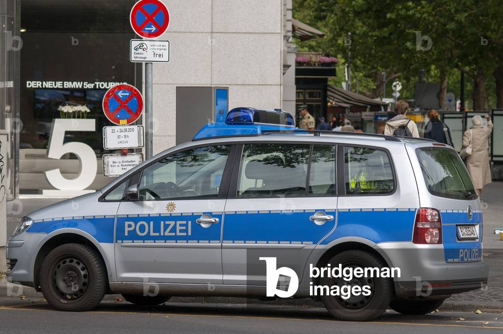 A police vehicle is parked in Kurfurstendamm in the Charlottenburg district, Berlin, Germany in Berlin, Germany (photo)