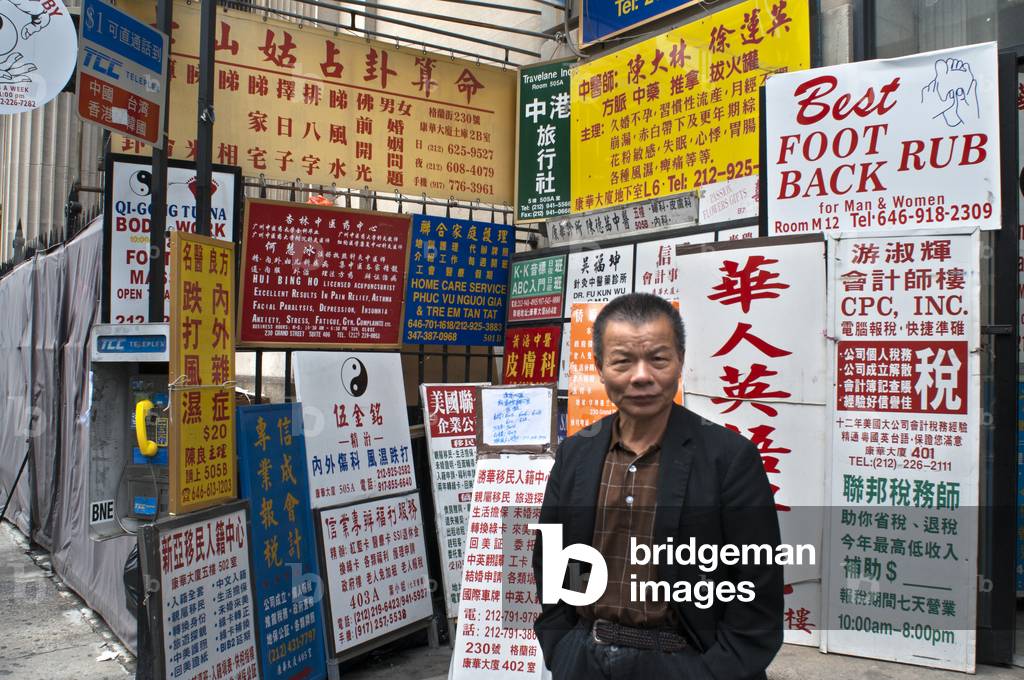 Street corner with Chinese advertising boards, Chinatown, Lower East Side, New York City, USA (photo)