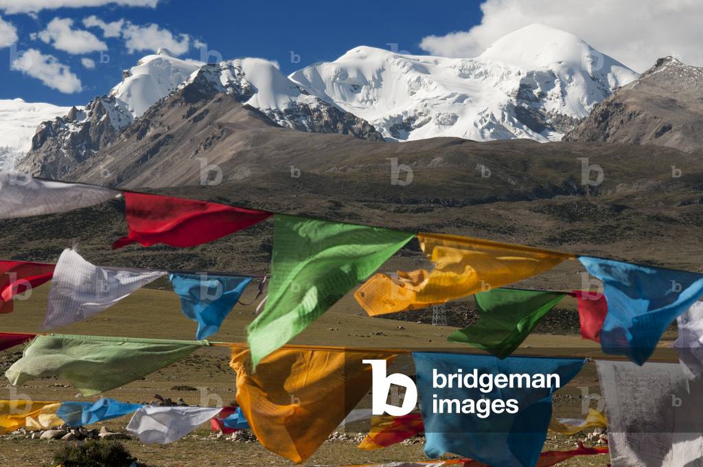 Prayer flags at the base of Mount Nyenchen Tanglha, Nam Tso, Tibet, China (photo)