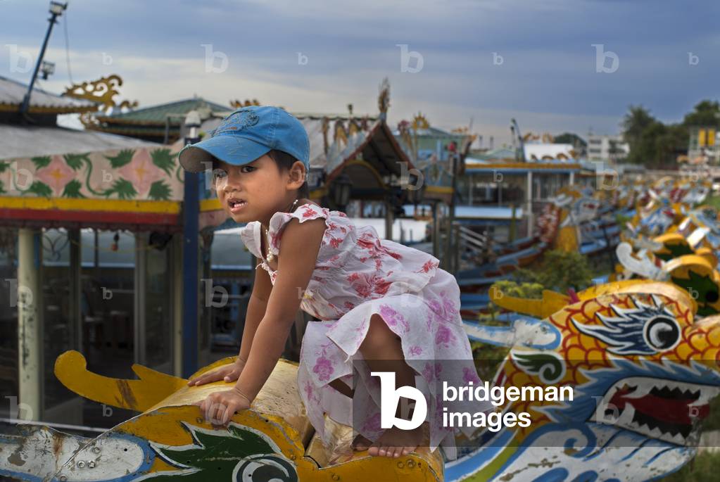 Nice girl up the Dragon boat cuise on the river Huong (Perfume River), Vietnam (photo)