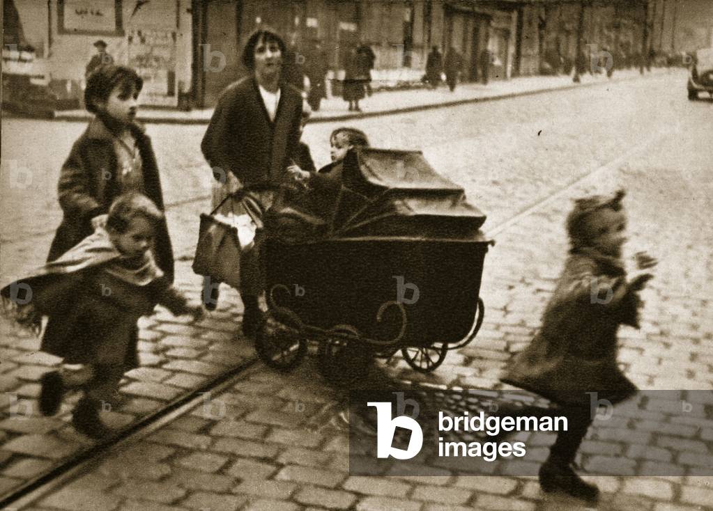 A mother and her four children in occupied France, 1940 (b/w photo)