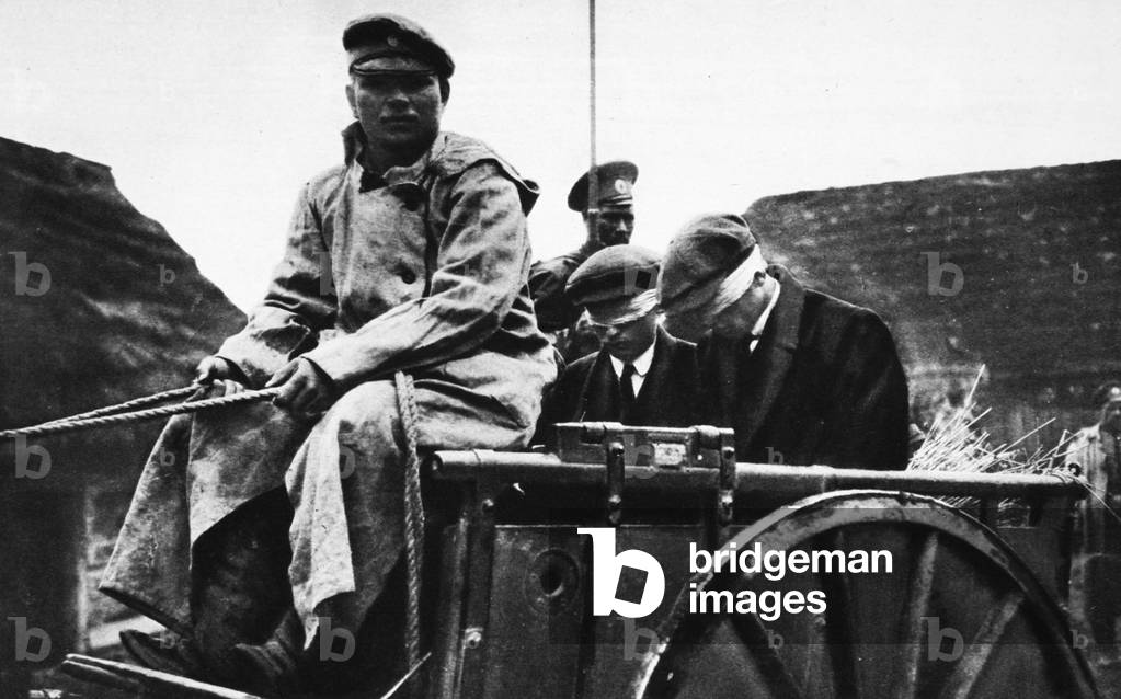 On the Way to Trial by Court-Martial: supposed spies taken blindfolded through the Russian lines, from 'The Illustrated War News' (b/w photo)