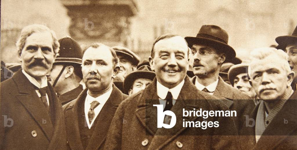 First Labour Government: Ramsay Macdonald, J.H. Thomas, Arthur Anderson and J.R. Clynes after leaving the palace, 1924 (sepia photo)