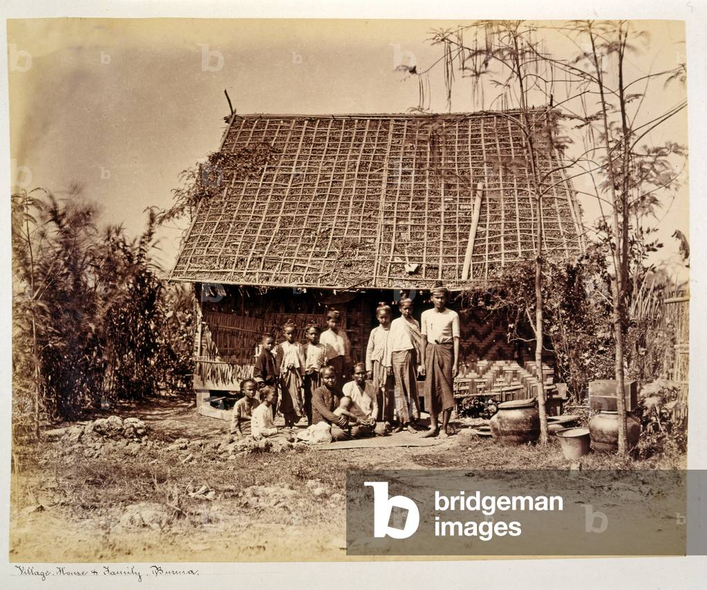 Village House and Family, Burma (sepia photo)