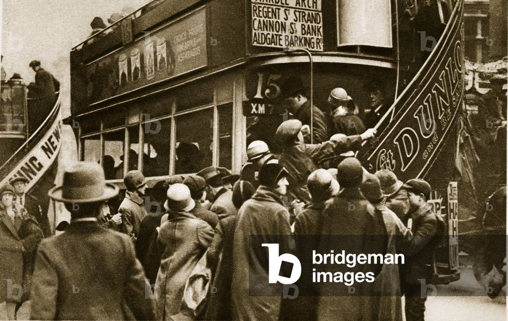 Londoners rushing for a bus on Ludgate Hill (sepia photo)