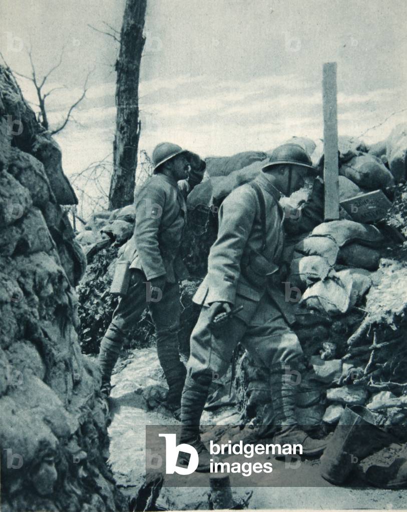 Image of Photography depicting The French Front: watching the enemy's trench through a periscope before a thro
