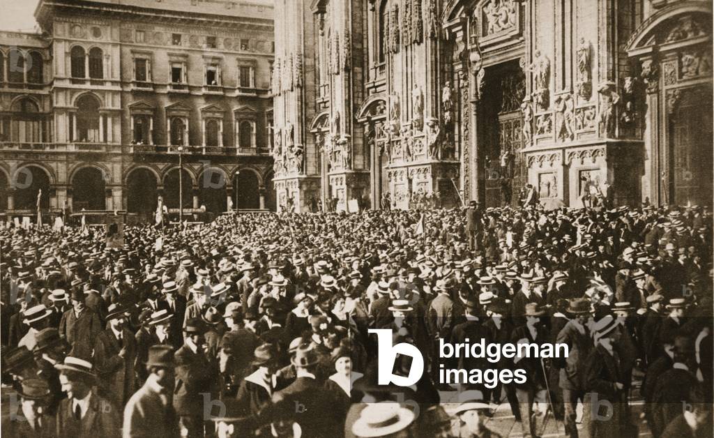 The great Intervention Movement in Italy: a dense crowd of demonstrators outside the Cathedral at Milan, from 'The Illustrated War News' (sepia photo)