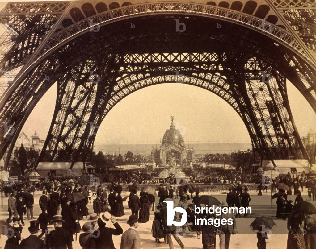 Looking through the base of Eiffel Tower, view towards the Central Dome, Paris Exhibition, 1889 (sepia photo)